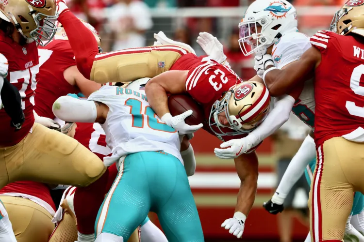 McCaffrey joins elite company with 100th career TD